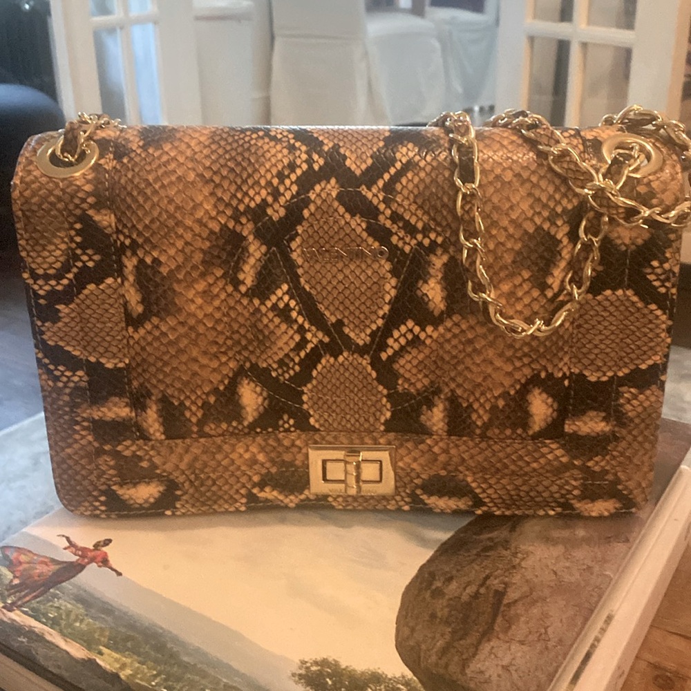 Authentic Valentino python hand bag. Tags and Dust bags included.